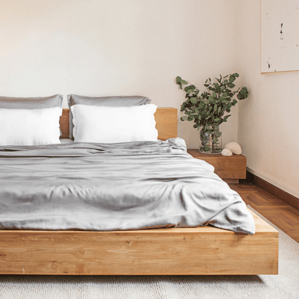16 Soft, breathable bamboo doona cover set in white, creating a cool and comfortable sleeping surface.