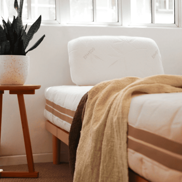 Dorsal Bed Frames Latex mattress supported by a slatted bed base for optimal spinal alignment, pressure relief, and enhanced breathability.