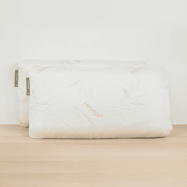 2 The Medium Density Side Sleeper Pillow by Heveya. Designed with a medium-density core for balanced comfort and support for side sleepers.