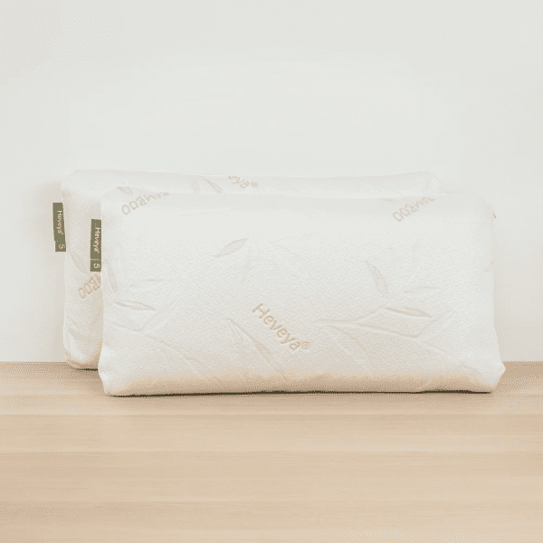 Close-up view of the Heveya Firm Pillow for Side Sleepers. This breathable, 100% natural latex pillow provides firm support and pressure relief for side sleepers.