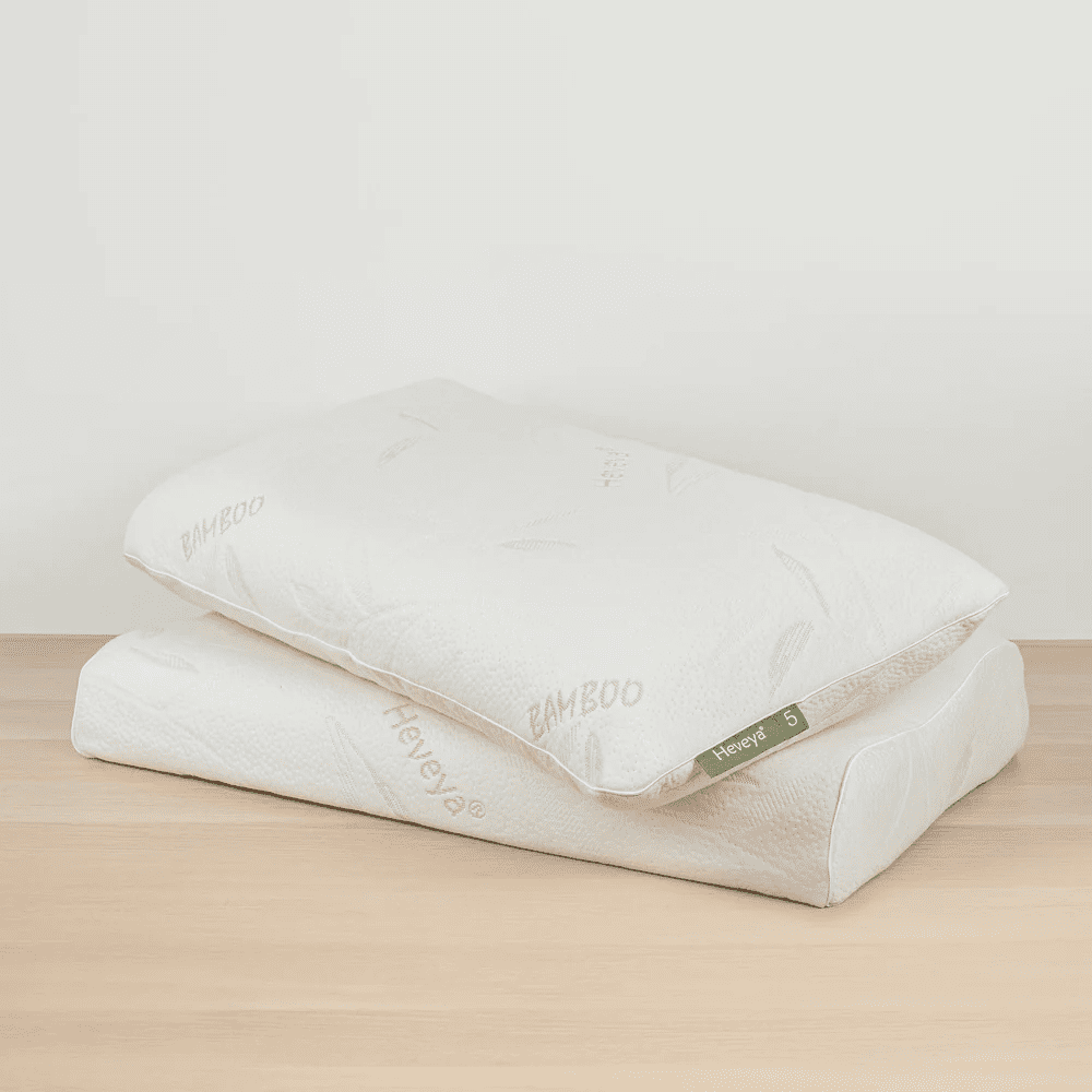 Explore the Heveya® Organic & Natural Latex Pillow Set options. Choose your perfect combination of firmness (soft, medium, firm) and shape (standard, contour) for personalized sleep comfort and spinal alignment.