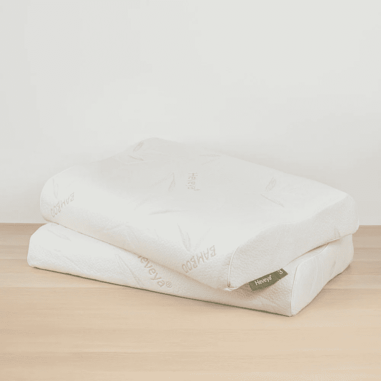 Another view of the Heveya Contoured Organic Latex Pillow, crafted from 100% natural latex. Ideal for side, back, and stomach sleepers seeking personalized comfort.