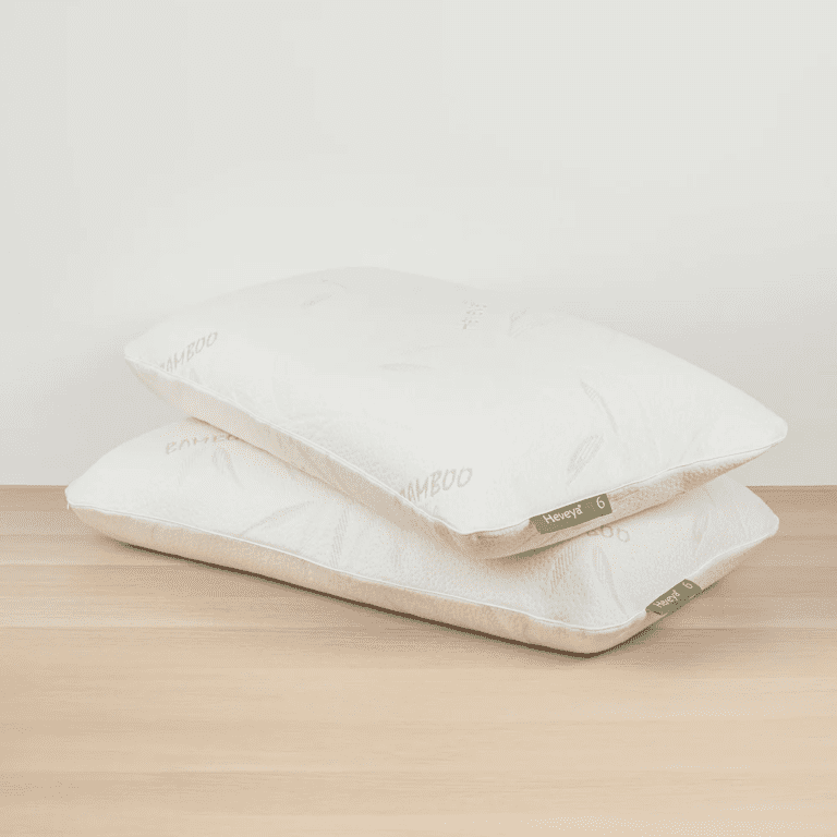 The Extra Firm Organic Latex Pillow from Heveya. Designed for side sleepers with broad shoulders, it offers maximum head, neck, and back support for a comfortable sleep