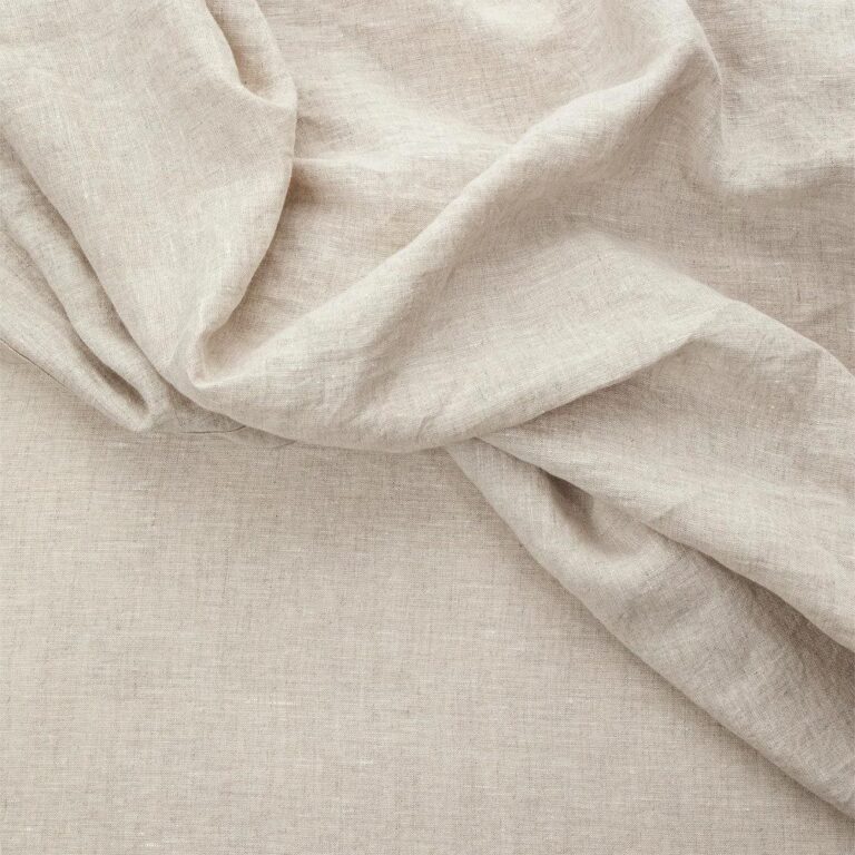 Close Up of a linen flat sheet set in natural