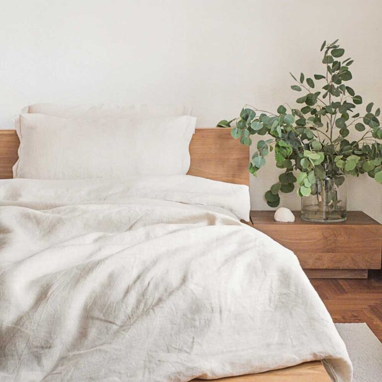 Linen Duvet Cover Set in natural resting on a bed